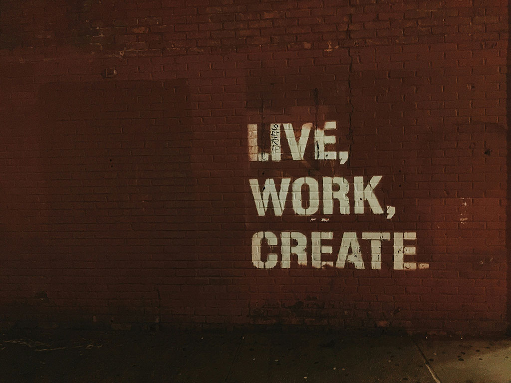 Graffiti that says Live, Work, Create